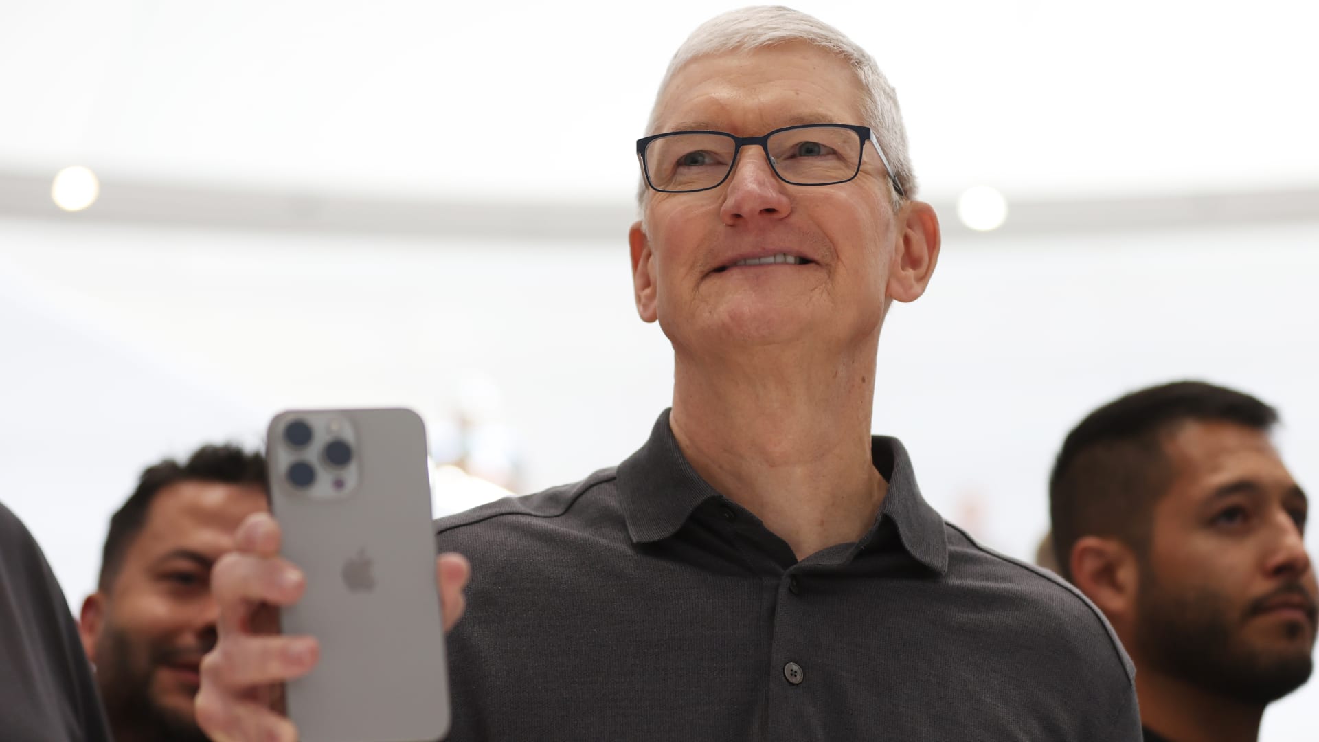 Apple CEO Tim Cook holds up a new iPhone 15 Pro during an Apple event on September 12, 2023 in Cupertino, California.