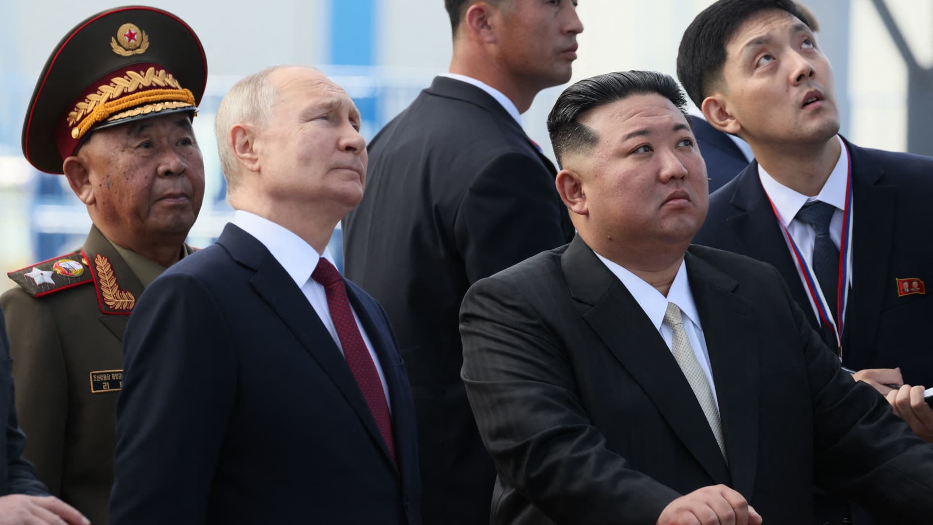 In this pool photo distributed by Sputnik agency, Russia's President Vladimir Putin (centre L) and North Korea's leader Kim Jong Un (centre R) visit the Vostochny Cosmodrome in Amur region on September 13, 2023.