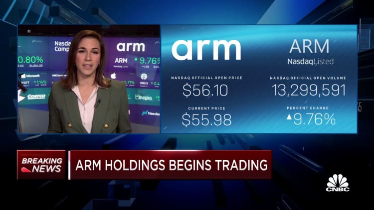 Arm opens at $56.10 per share in market debut