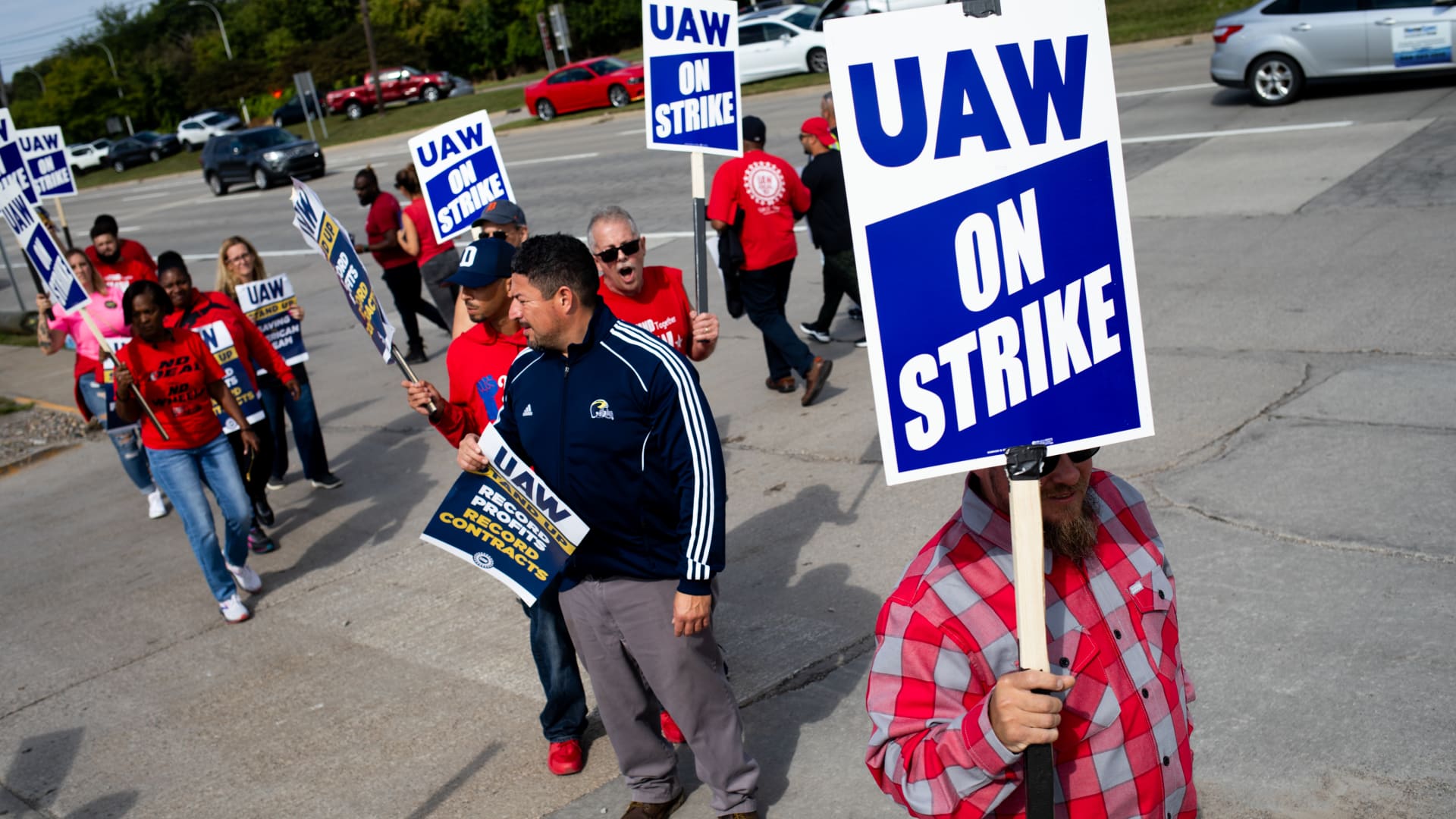 UAW members go on strike at three key auto crops after deal deadline passes