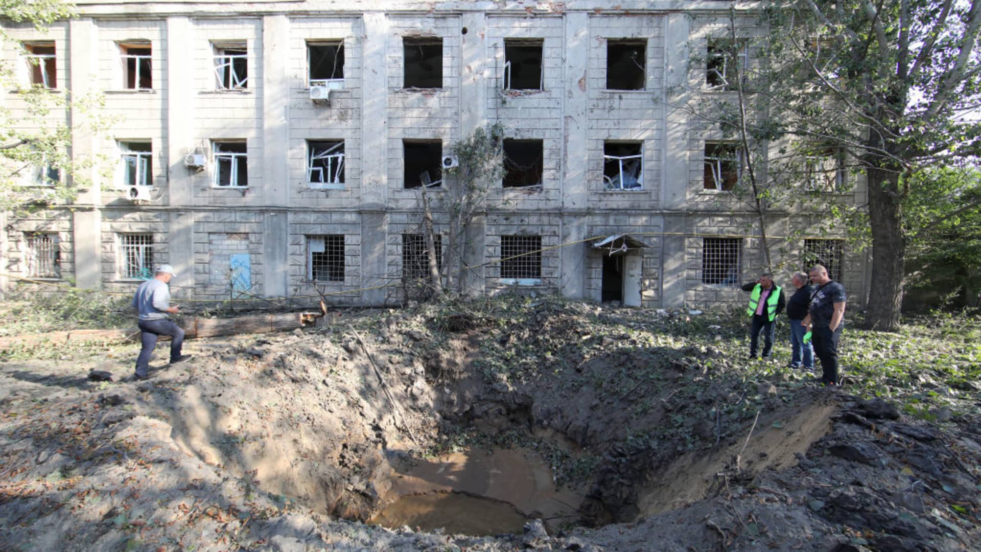 The crater from a Russian missile is seen outside a building after an attack which occurred on Thursday morning, September 21, Kharkiv, northeastern Ukraine. 