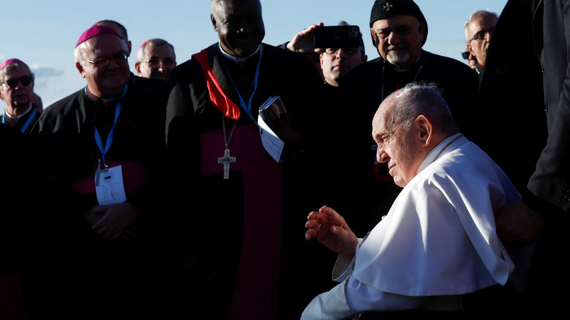 Pope Francis greets faithful, near the stele dedicated to sailors and migrants lost at sea, as part of the Mediterranean meetings (MED2023) in Marseille, France, September 22, 2023.