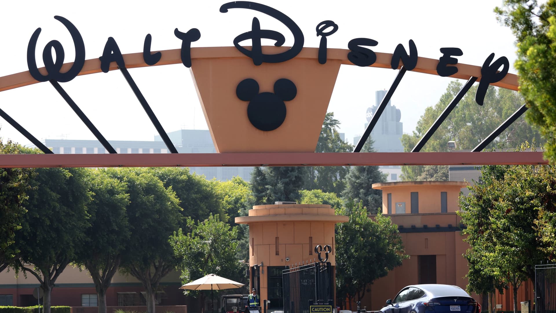 A vehicle drives through the main gate at The Walt Disney Studios in Burbank, California, on Sept. 25, 2023.