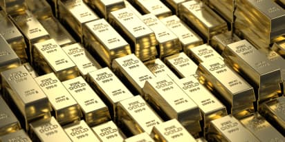 Gold price hits $2,100 for record high — and analysts don't expect it to stop there