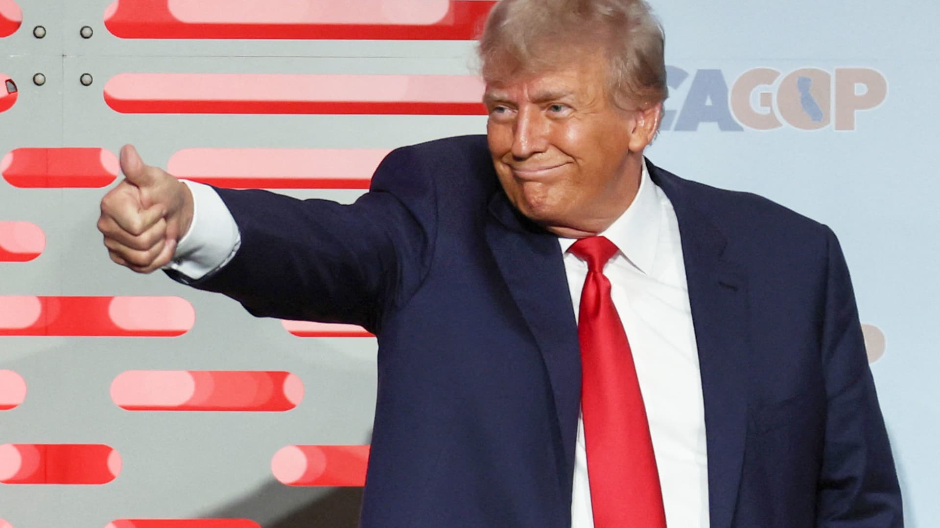 Former U.S. President and Republican presidential candidate Donald Trump gestures after his speech at the fall convention of the California Republican Party in Anaheim, California, September 29, 2023.