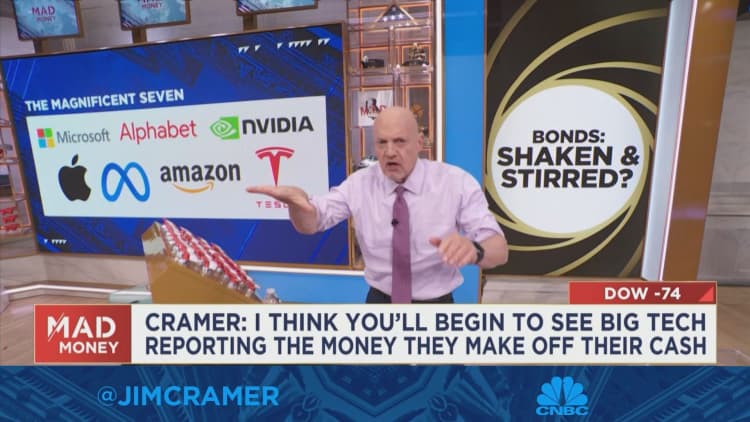 I think you'll begin to see big tech reporting the money they make off their cash, says Jim Cramer