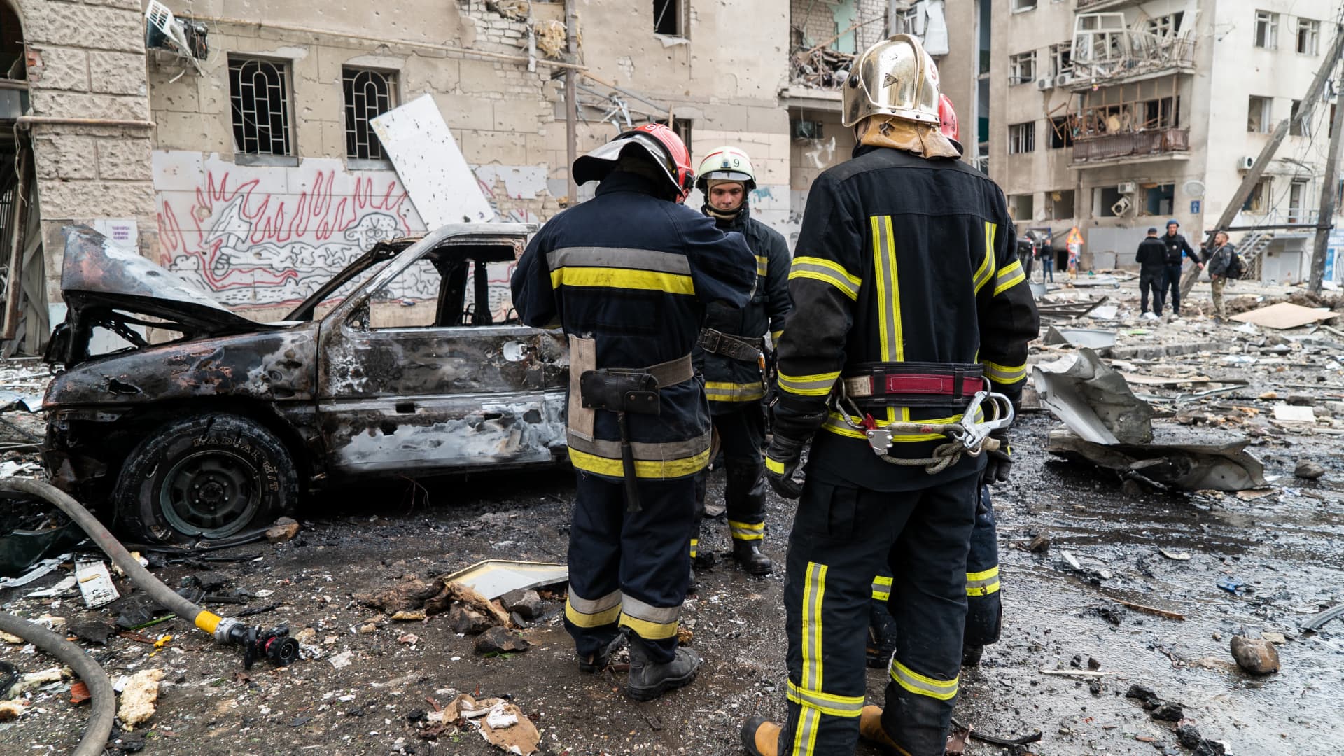 Rescuers conduct search and rescue operation in the central residential district hit by Russian Iskander missile on the morning on October 6, 2023 in Kharkiv, Ukraine. 