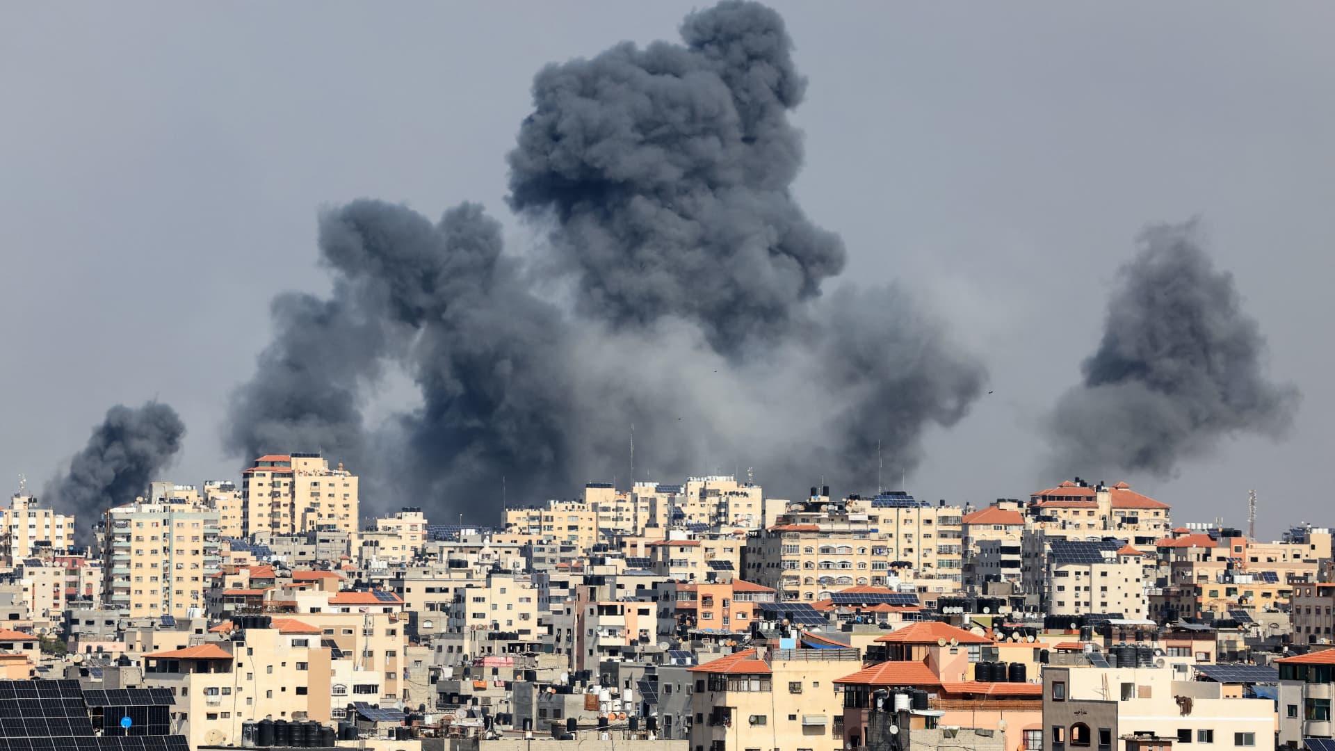 Smoke rises over Gaza City on October 7, 2023 during Israeli air strike. 
