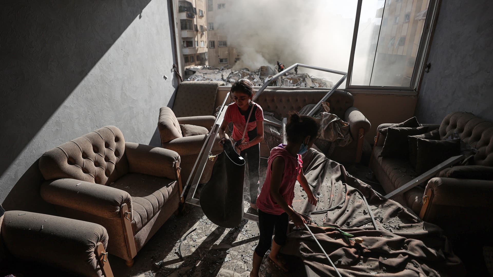 Children are seen in a destroyed house after Israeli attacks in Gaza City, Gaza on October 07, 2023.