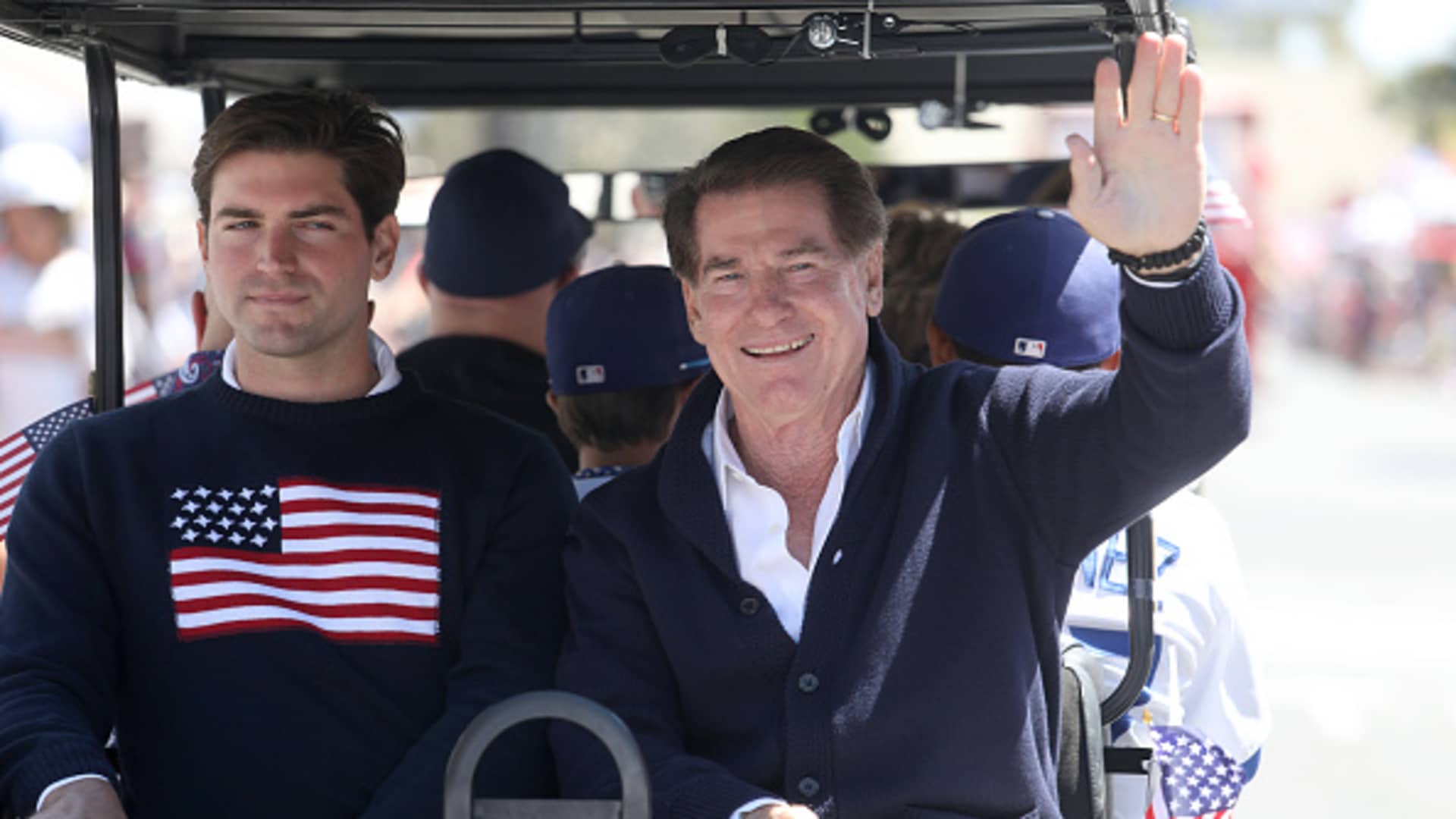 Steve Garvey, right, former first baseman with the Los Angeles Dodgers, with son Ryan Garvey, left, is a guest of honor at the Huntington Beach Fourth of July Parade along Main Street in downtown in Huntington Beach, California, on July 4, 2022.
