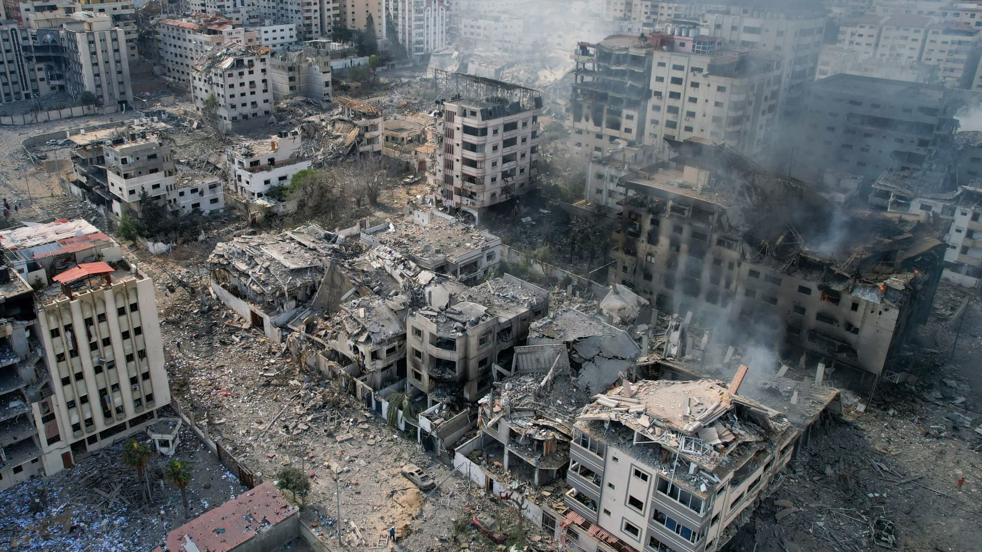 This aerial photo shows heavily damaged buildings following Israeli airstrikes in Gaza City on Oct. 10, 2023.