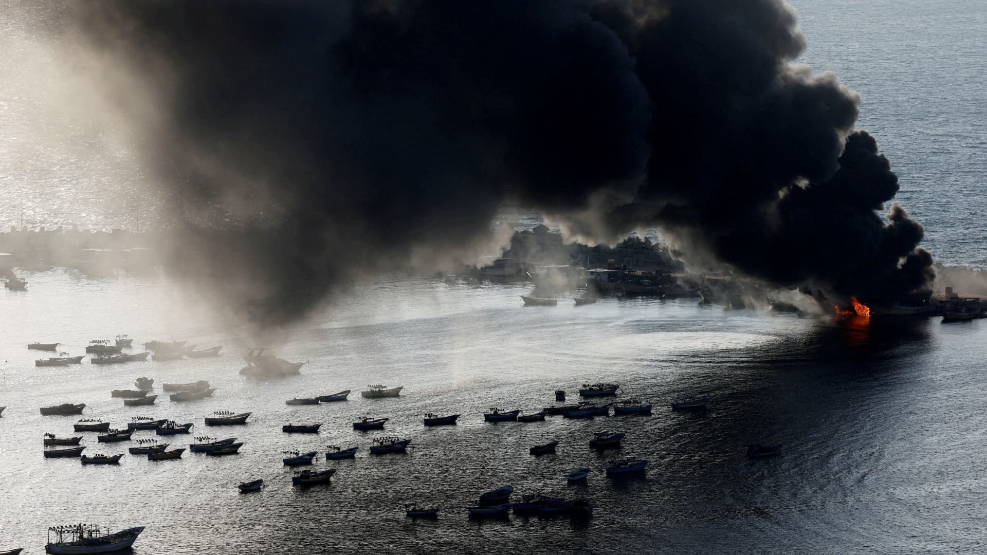 Smoke rises after Israeli strikes on the seaport of Gaza City, in Gaza, October 10, 2023.