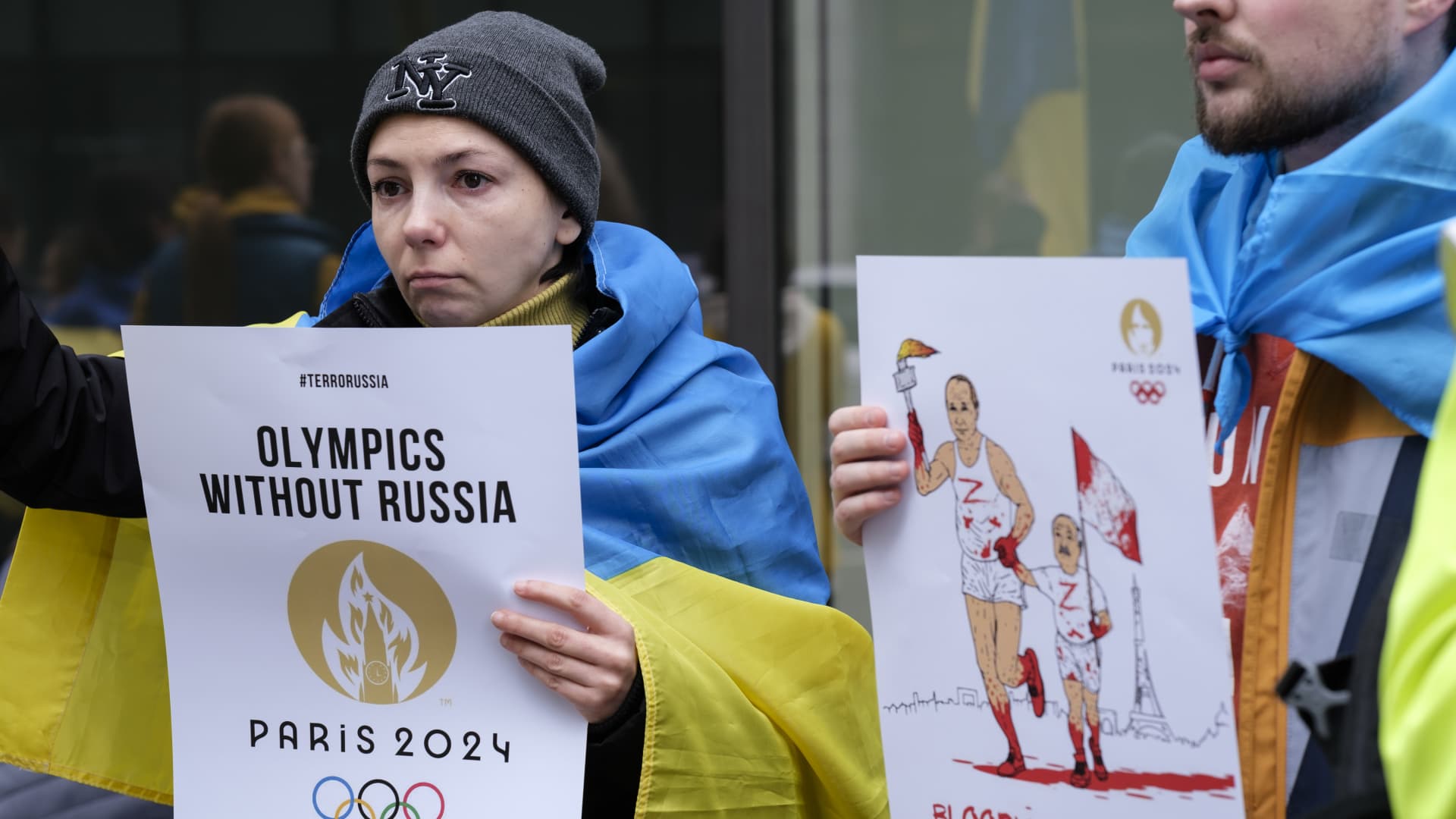 A group of Ukrainians demonstrate in front of the European headquarter of the International Olympic Committee (IOC) on March 29, 2023 in Brussels, Belgium.