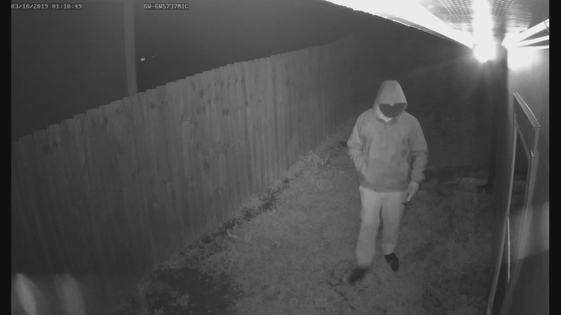 Surveillance footage CNBC obtained captures someone breaking into Zhong's home in March 2019.