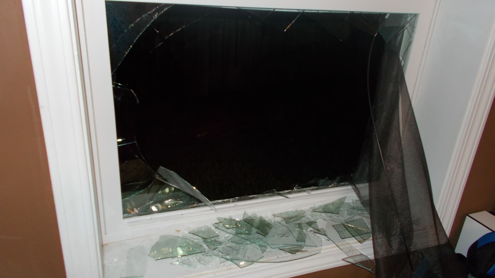 In March 2019, someone broke into Zhong's home, shattering the window.