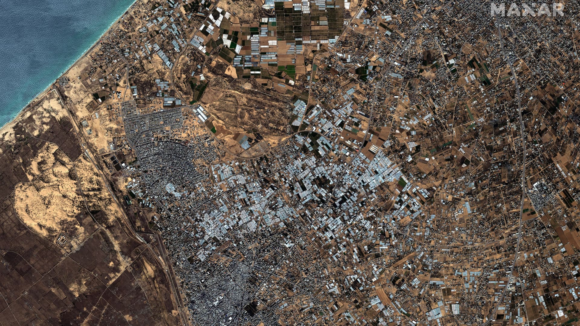 A Maxar satellite image focuses on the southern border of Gaza and the Rafah border crossing into Egypt on Oct. 15, 2023.