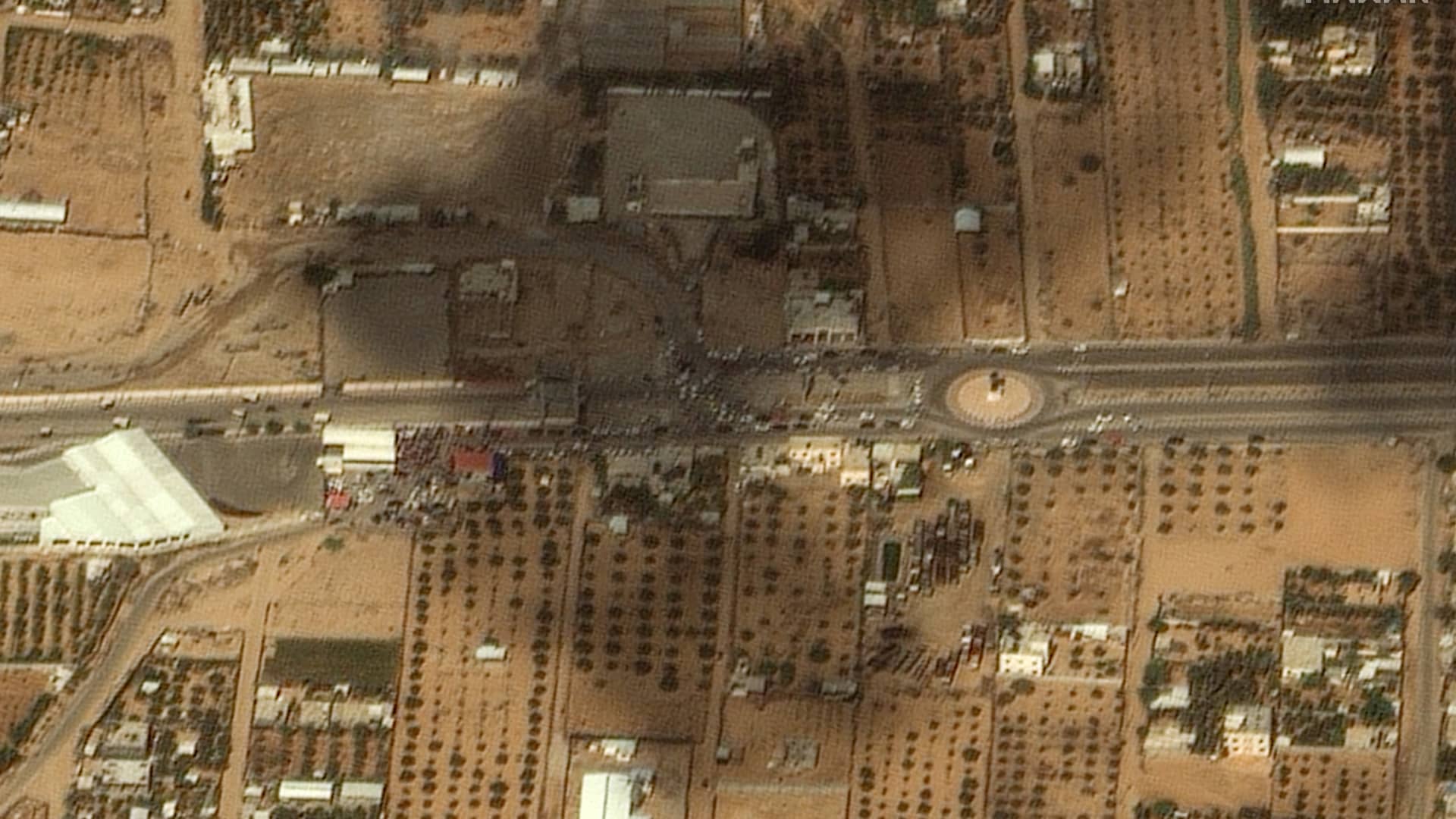Crowds of people and vehicles form on the Gaza side of the Rafah border crossing into Egypt in this Maxar satellite image taken on Oct. 16, 2023.