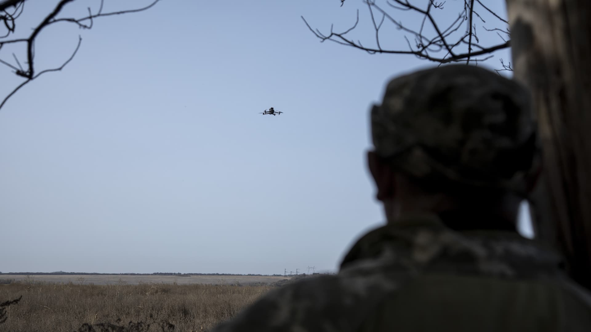 Mykola, a drone operator of Brigade 28th of Ukrainian Army, watches a drone landing as he scouts for enemy positions using a modified flying device in the frontline nearby Kurdyumivka City in Donetsk region, Ukraine, October 03, 2023.
