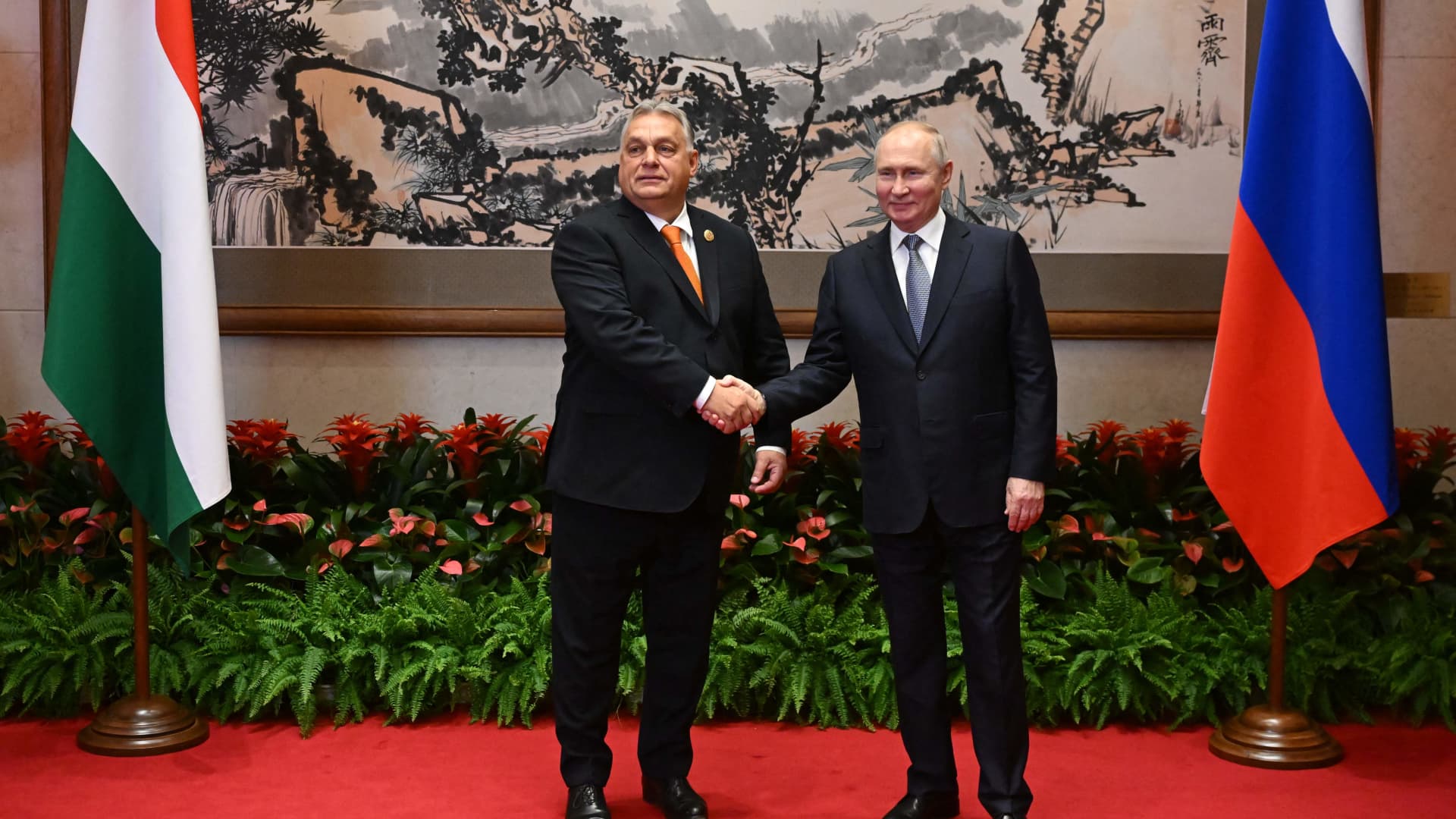 A pool photograph distributed by Russian state owned agency Sputnik shows Russia's President Vladimir Putin meeting with Hungarian Prime Minister Viktor Orban on the sidelines of the Third Belt and Road Forum in Beijing on October 17, 2023.