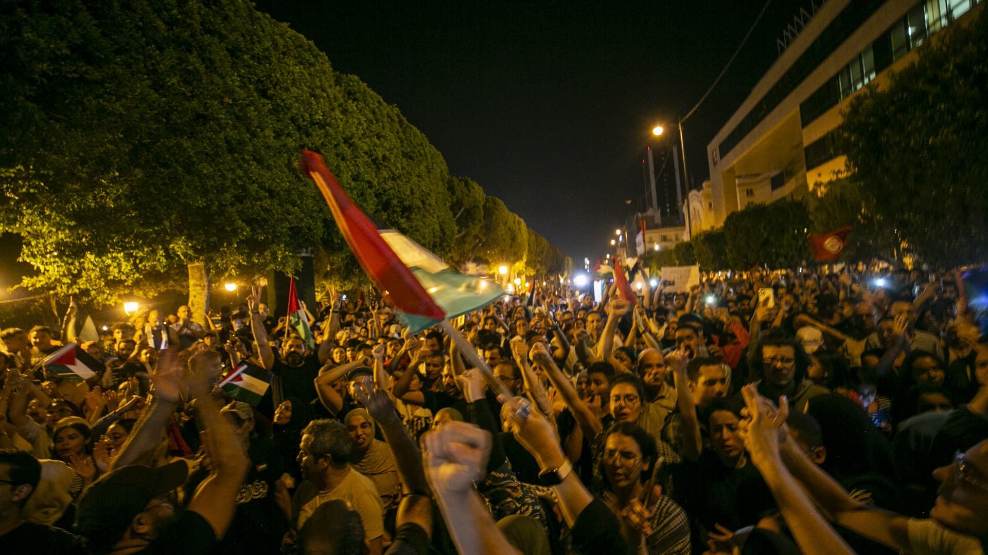People gather in front of the French Embassy at Avenue Habib Bourguiba to protest against Israeli airstrike on Al-Ahli Baptist Hospital in Gaza as Israeli attacks continue, in Tunis, Tunisia on October 17, 2023. (Photo by Yassine Gaidi/Anadolu via Getty Images)