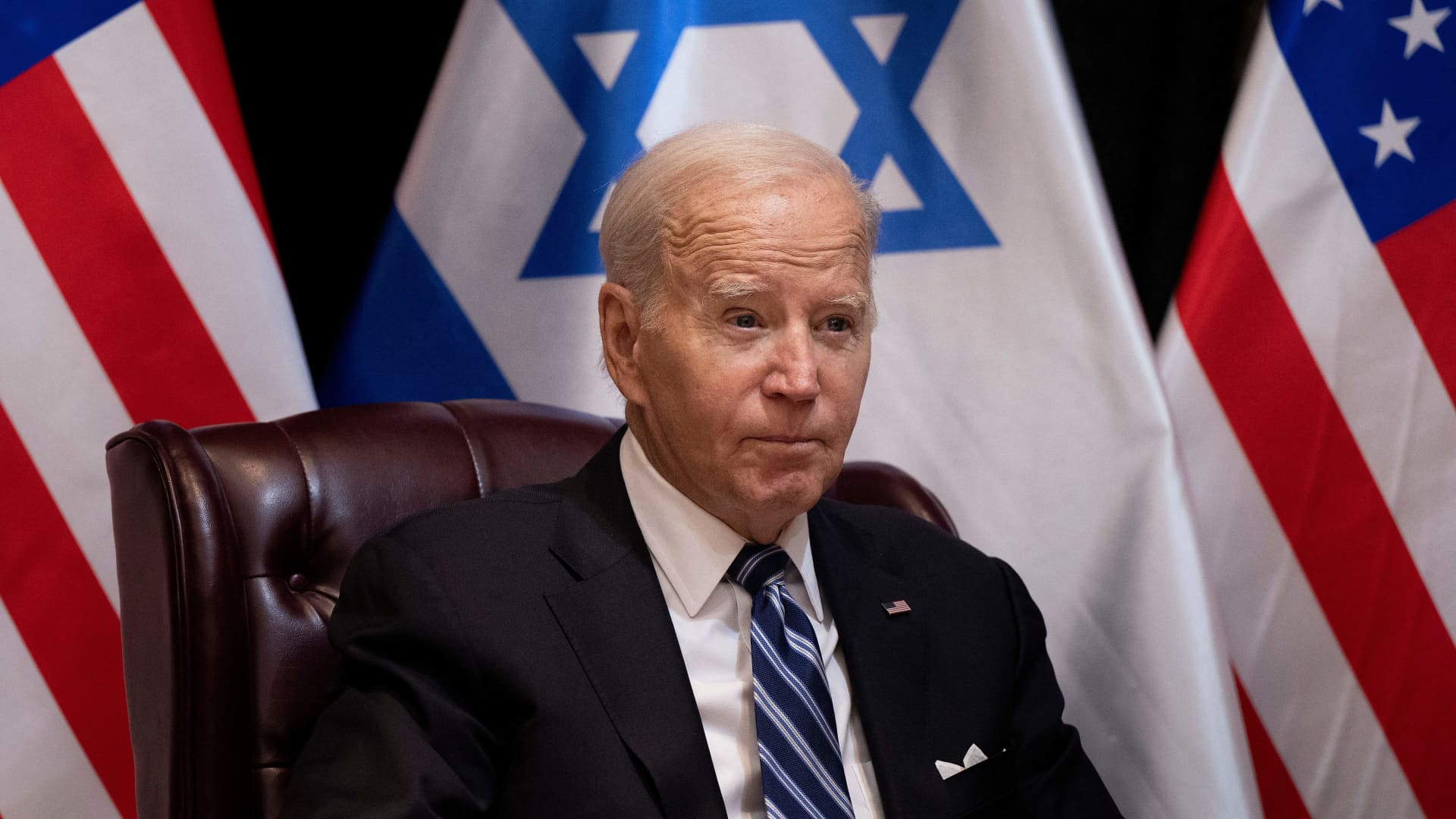 US President Joe Biden joins Israel's Prime Minister for the start of the Israeli war cabinet meeting, in Tel Aviv on October 18, 2023, amid the ongoing battles between Israel and the Palestinian group Hamas. 