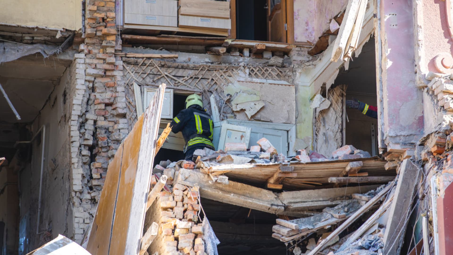 Ukrainian search and rescue team conduct operation in rubble of a residential building that destroyed following Russian rocket attack as Russia and Ukraine war continue in Zaporizhzhia, southeastern Ukraine on October 18, 2023. 