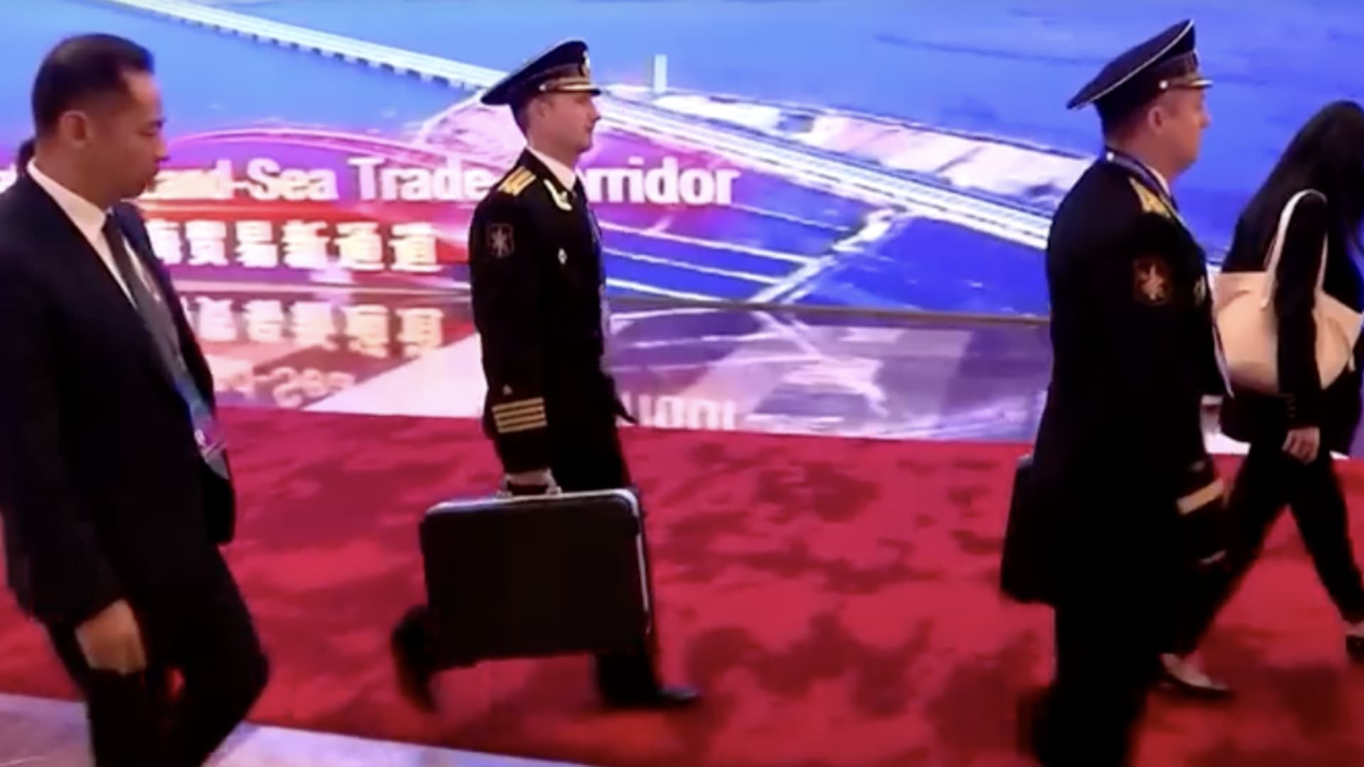 A video still showing an officer with the Russian nuclear briefcase on Oct. 18th, 2023.