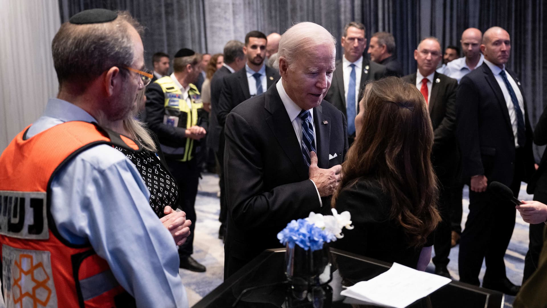 U.S. President Joe Biden meets with people affected by the Palestinian militant group Hamas' recent attacks on Israel, in Tel Aviv, Oct. 18, 2023.
