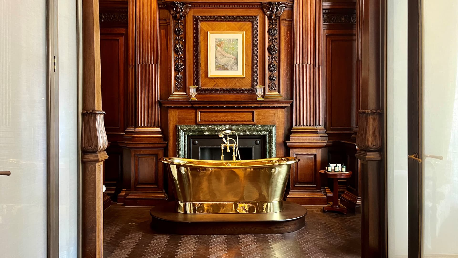 A roll top bath takes center stage in the opulent bathroom of the Granville Suite, named after British spy Christine Granville.