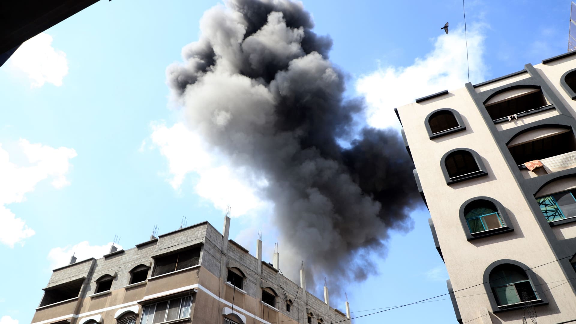 Smoke rises following an Israeli airstrike in the southern Gaza Strip city of Khan Younis, on Oct. 18, 2023.
