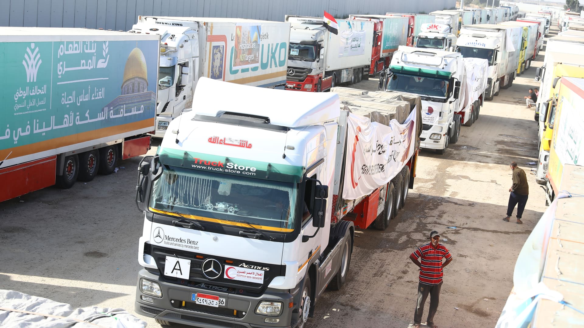 First convoy of relief trucks begins to enter the Gaza Strip from the Egyptian side of the Rafah crossing, in Rafah, Gaza on October 21, 2023.
