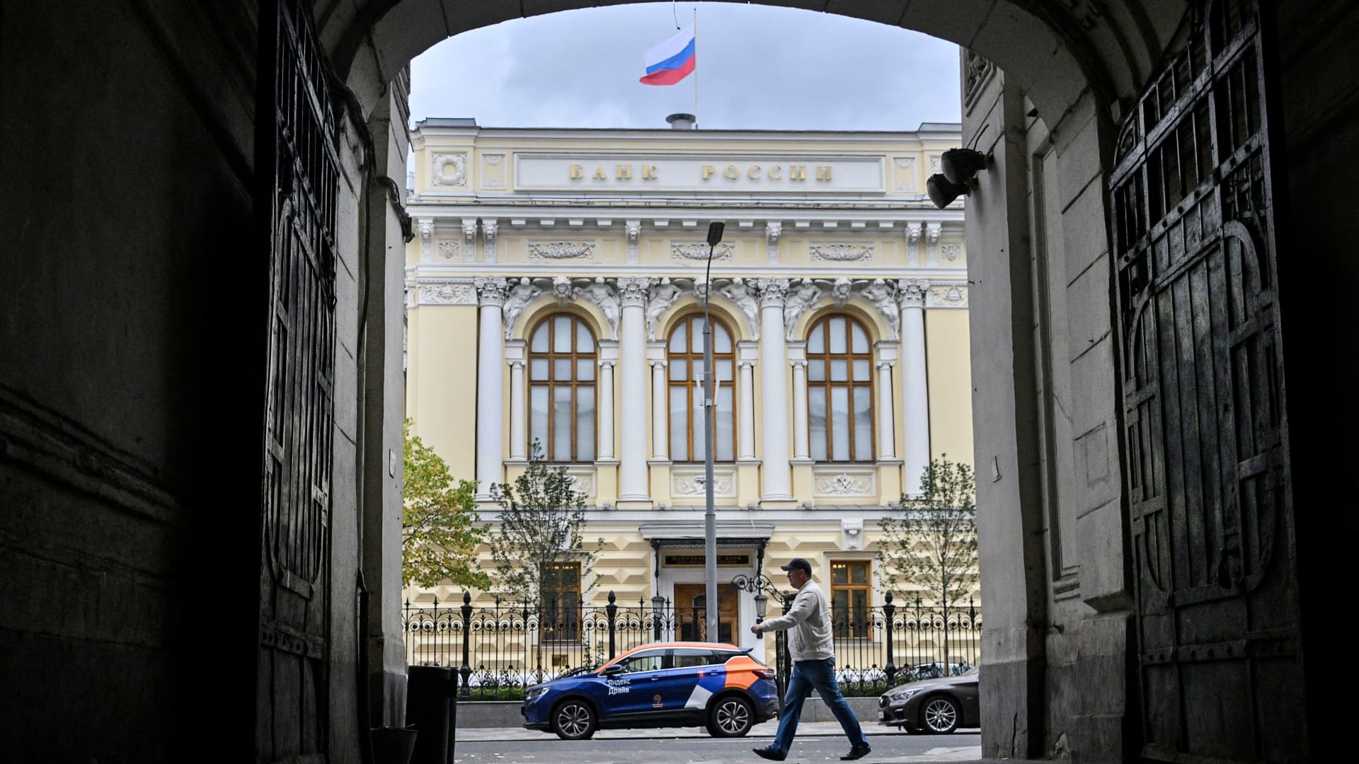 A man walks past the Russian Central Bank headquarters in downtown Moscow on September 6, 2023.