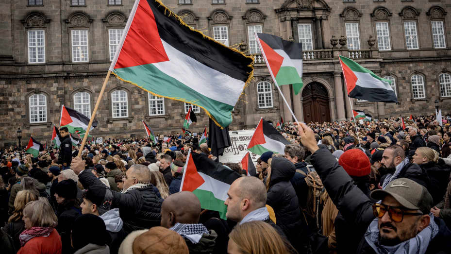 People take part in a demonstration organized by Amnesty International Denmark, CARE Denmark and Mellemfolkeligt Samvirke, amid the ongoing conflict between Israel and Hamas, at Christiansborg Palace Square in Copenhagen, Denmark October 28, 2023. Ritzau Scanpix/Emil Nicolai Helms/via REUTERS ATTENTION EDITORS - THIS IMAGE WAS PROVIDED BY A THIRD PARTY. DENMARK OUT. NO COMMERCIAL OR EDITORIAL SALES IN DENMARK.