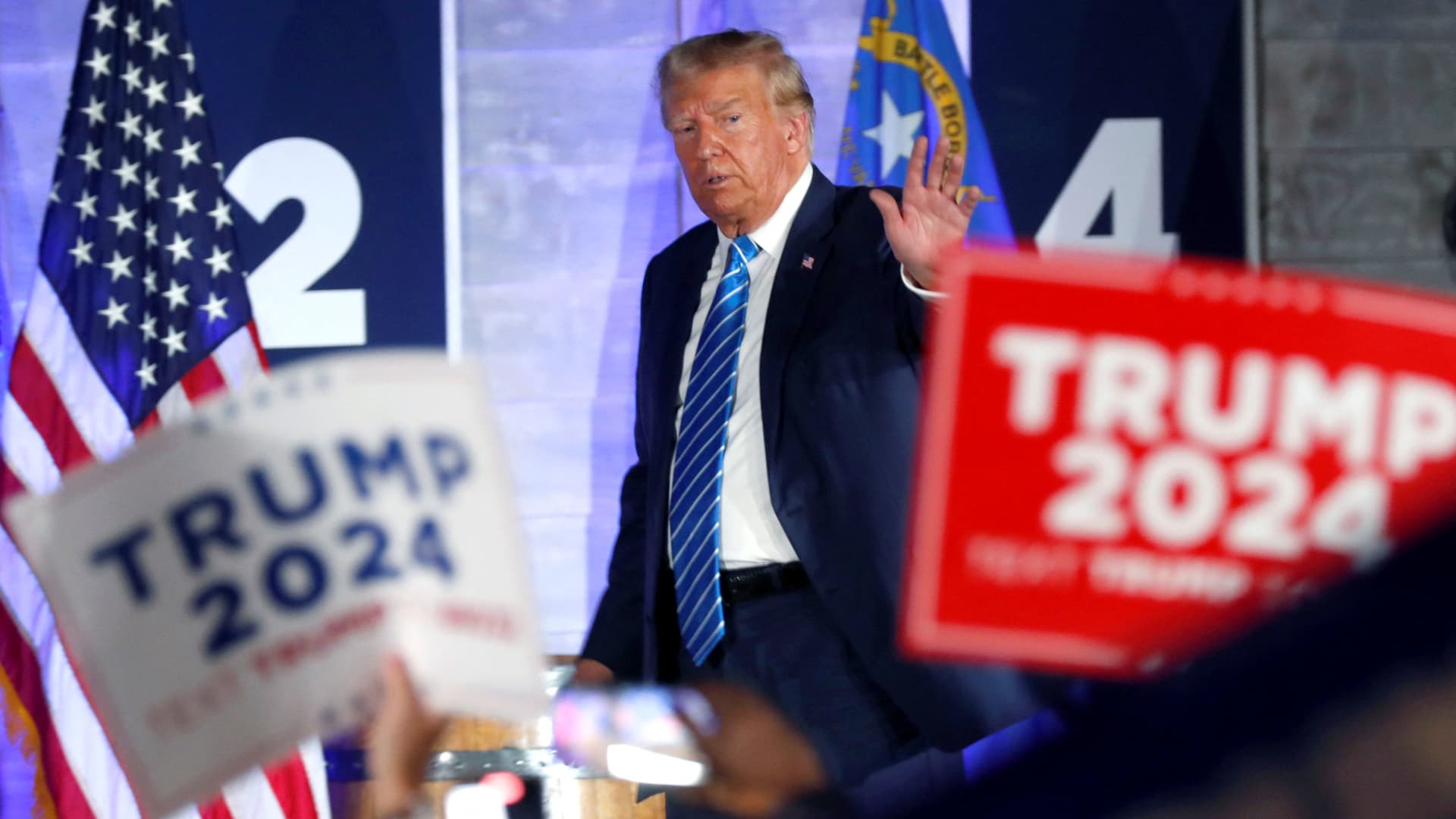 Former U.S. President Donald J. Trump leaves the stage after speaking to supporters at a Team Trump Nevada Commit to Caucus rally in Las Vegas, Nevada, U.S. October 28, 2023. 