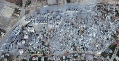 Thousands break into UN warehouses in Gaza; satellite images show destruction in Gaza