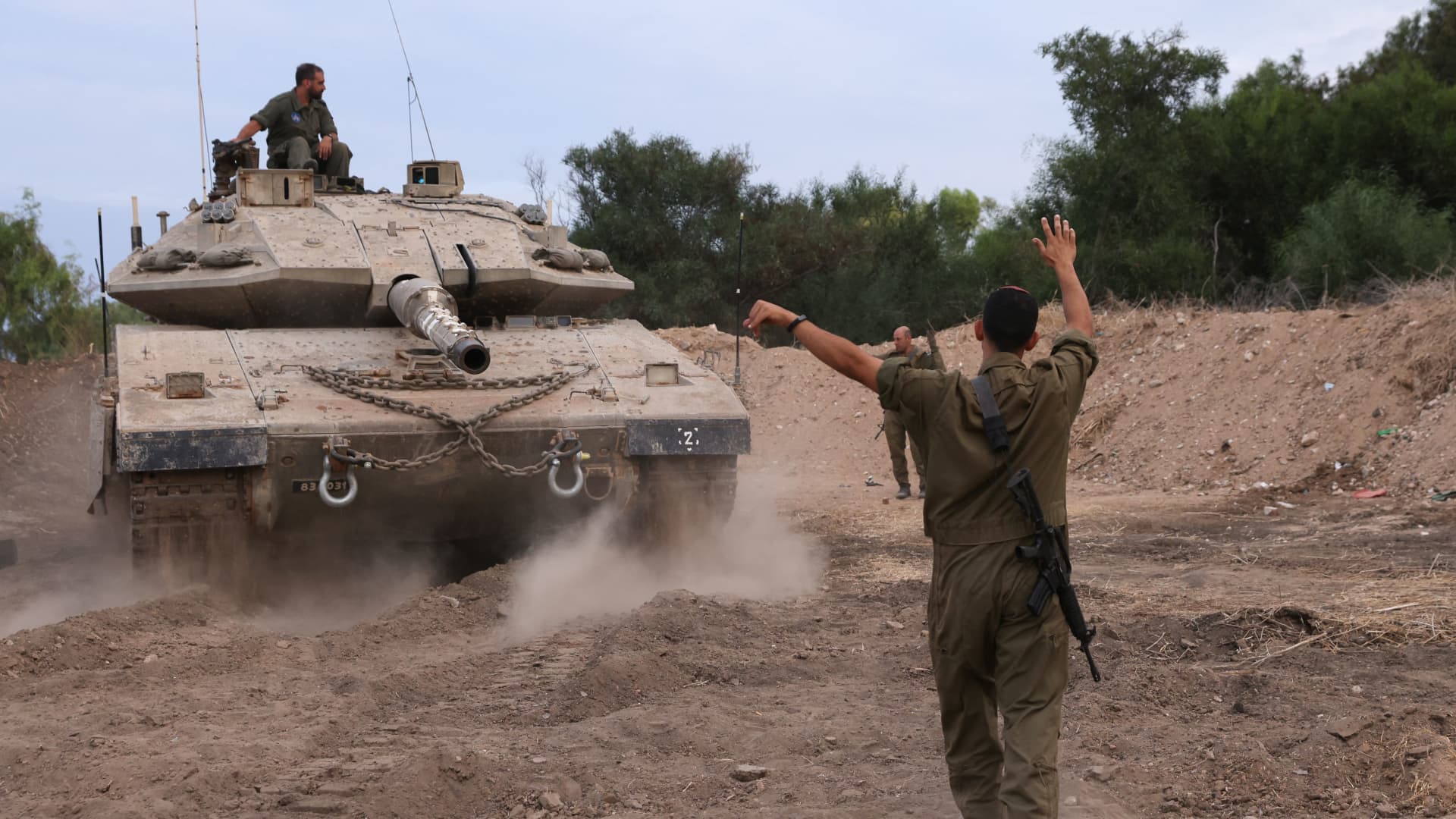 An Israeli tank is positioned in the western Galilee area, near Israel's northern border with Lebanon on October 30, 2023, amid the ongoing battles between Israel and the Palestinian group Hamas.