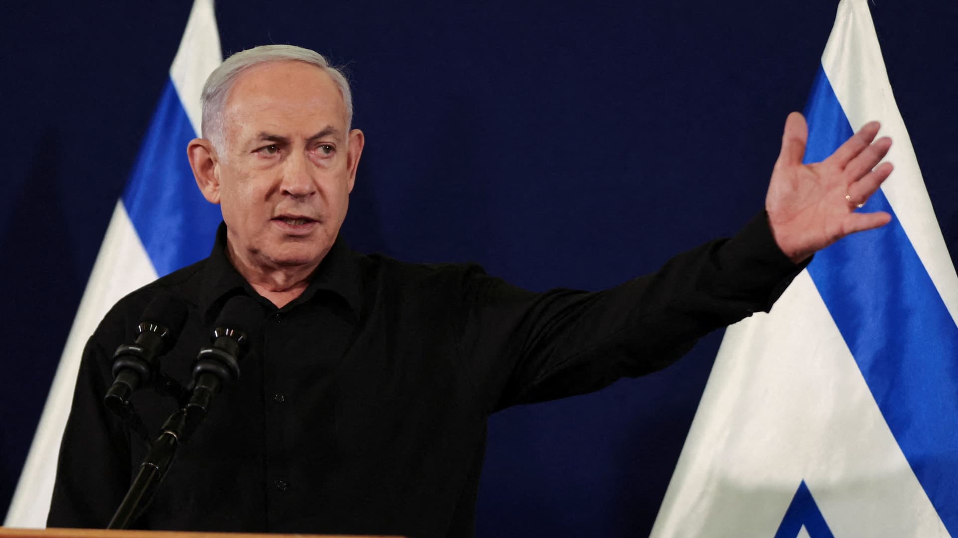 Israeli Prime Minister Benjamin Netanyahu holds a press conference with Defense Minister Yoav Gallant and Cabinet Minister Benny Gantz (not pictured) in the Kirya military base in Tel Aviv , Israel , 28 October 2023.