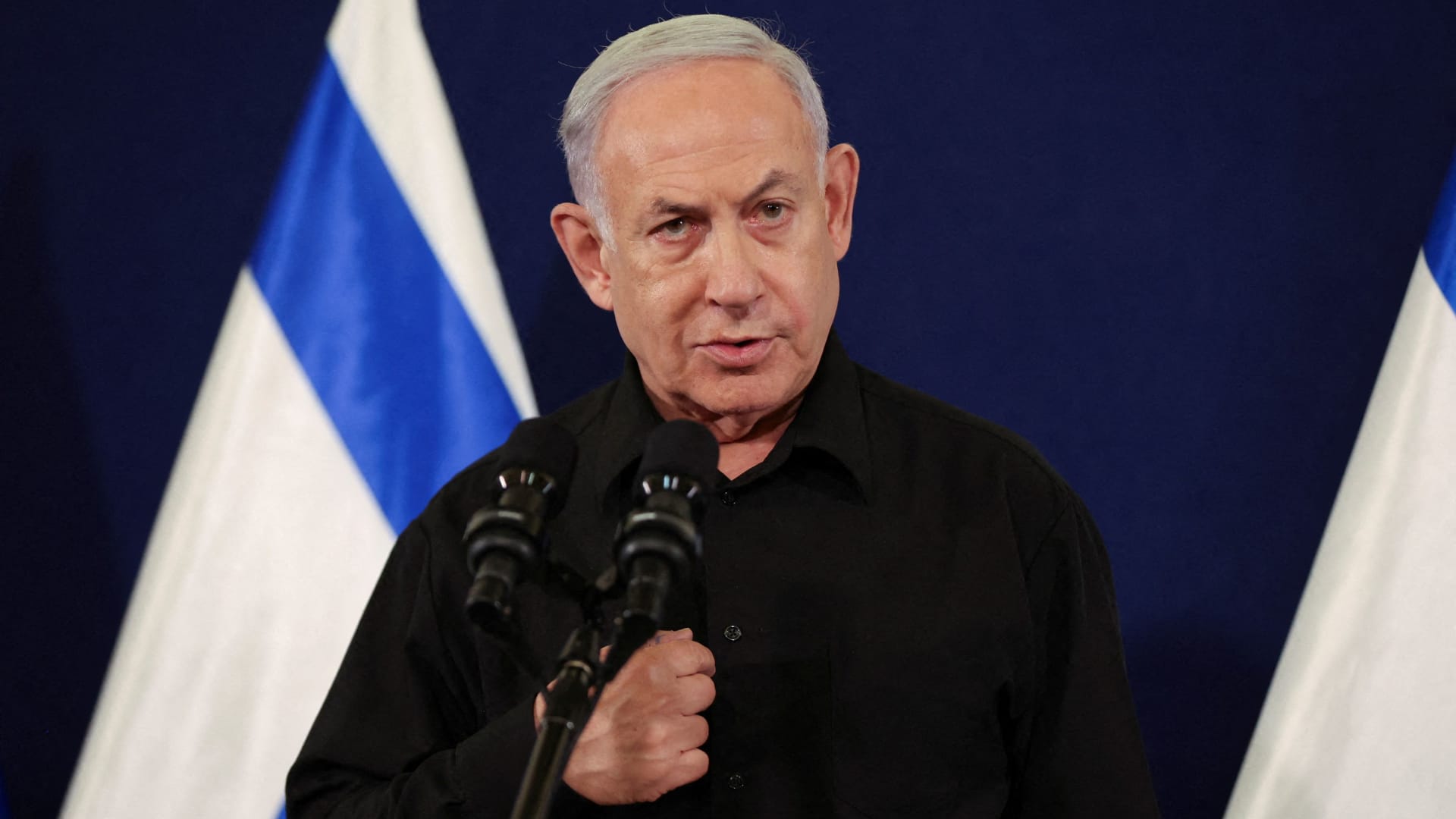 Israeli Prime Minister Benjamin Netanyahu holds a press conference with Defense Minister Yoav Gallant and Cabinet Minister Benny Gantz (not pictured) in the Kirya military base in Tel Aviv , Israel , 28 October2023. 