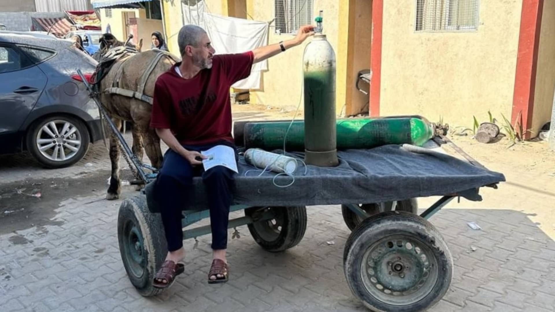 A Palestinian man living in Nuseirat Camp travels from hospital to hospital in search of oxygen with a donkey cart since he cannot find fuel due to the full embargo imposed on Gaza in Deir al-Balah, Gaza on November 01, 2023. (Photo by Doaa Albaz/Anadolu via Getty Images)