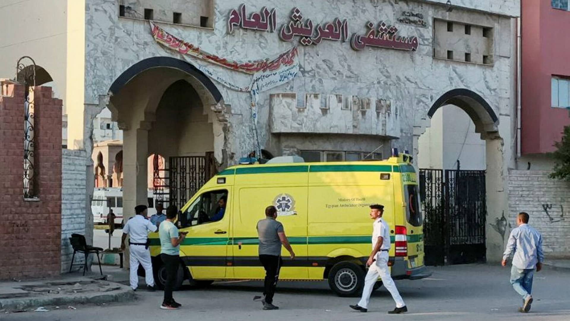 Security guards check an Egyptian ambulance carrying critically injured Palestinians as they arrive at Al-Arish hospital through the Rafah border crossing, amid the ongoing conflict between Israel and the Palestinian Islamist group Hamas in the city of Al-Arish, Sinai Peninsula, Egypt November 1, 2023. 
