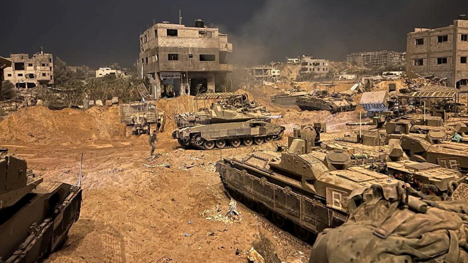 Armoured vehicles of the Israel Defense Forces (IDF) are seen during their ground operations at a location given as Gaza, as the conflict between Israel and the Palestinian Islamist group Hamas continues, in this handout image released on November 1, 2023. 