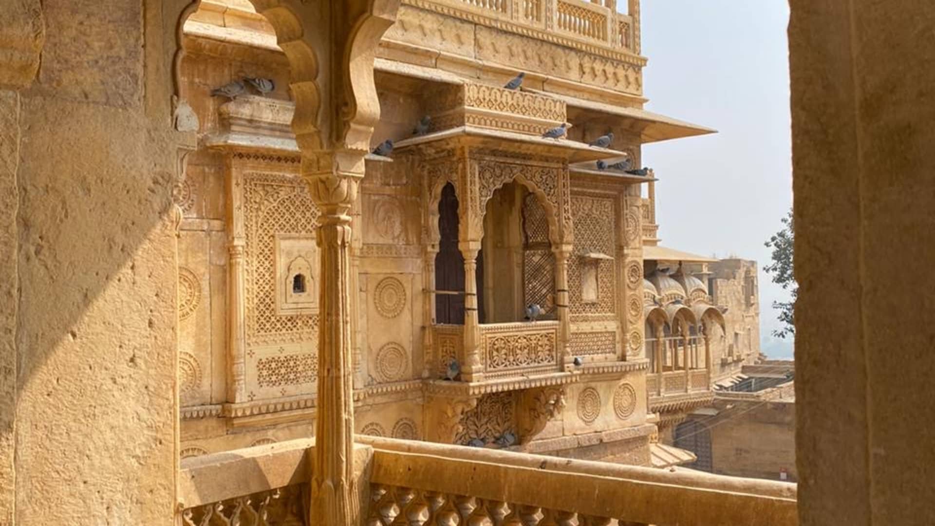 The fort has intricate hand-carved balconied windows, known as 