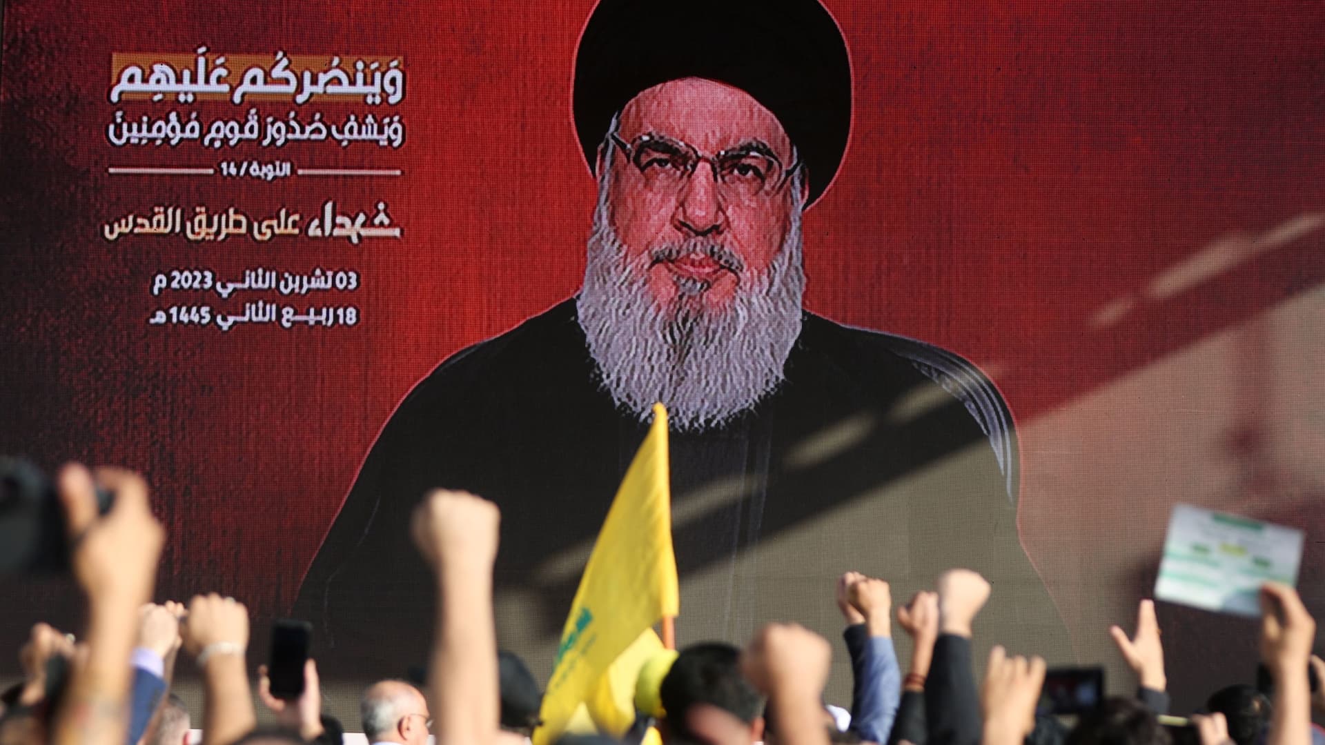 Lebanon's Hezbollah leader Sayyed Hassan Nasrallah appears on a screen as he addresses his supporters during a ceremony to honour fighters killed in the recent escalation with Israel, in Beirut's southern suburbs, Lebanon November 3, 2023. 