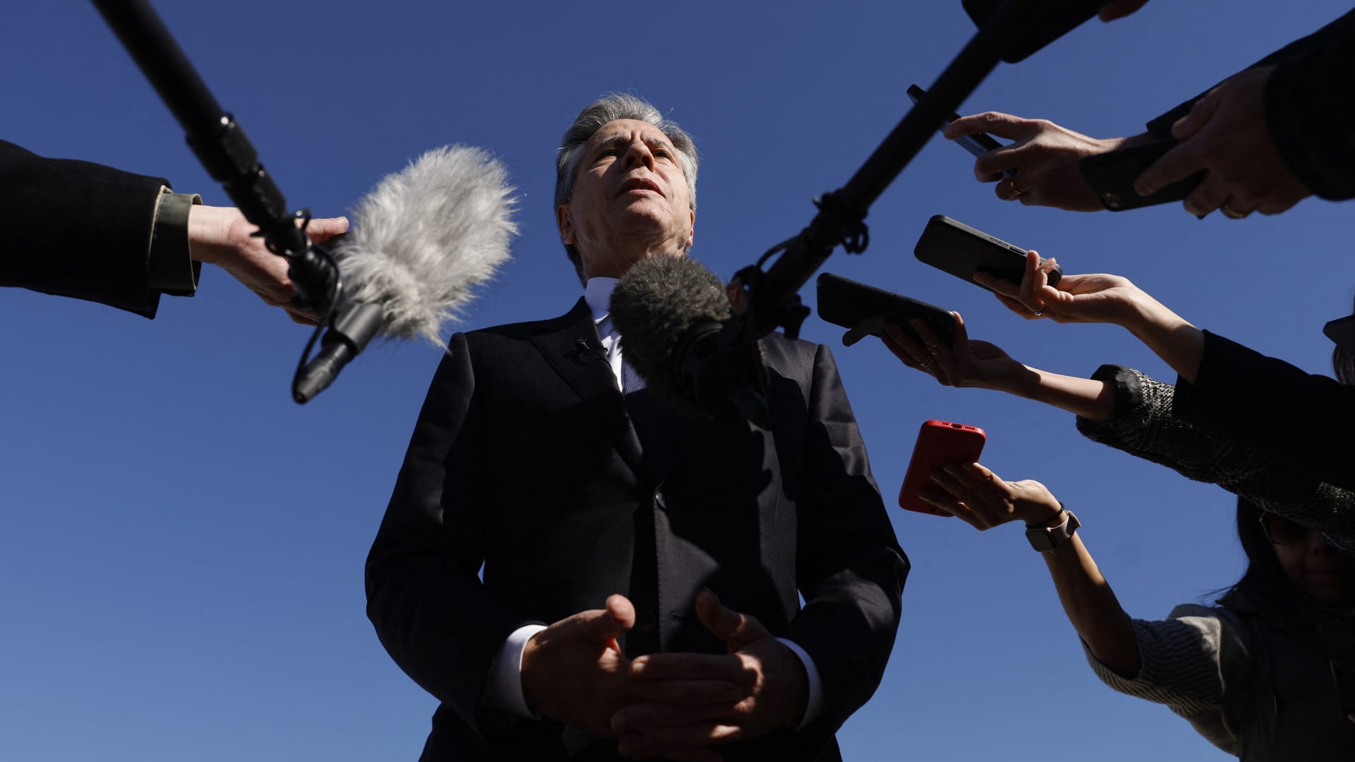 U.S. Secretary of State Antony Blinken talks to reporters prior to boarding his aircraft at Joint Base Andrews in Maryland, on his way to the Middle East and Asia, on Nov. 2, 2023.