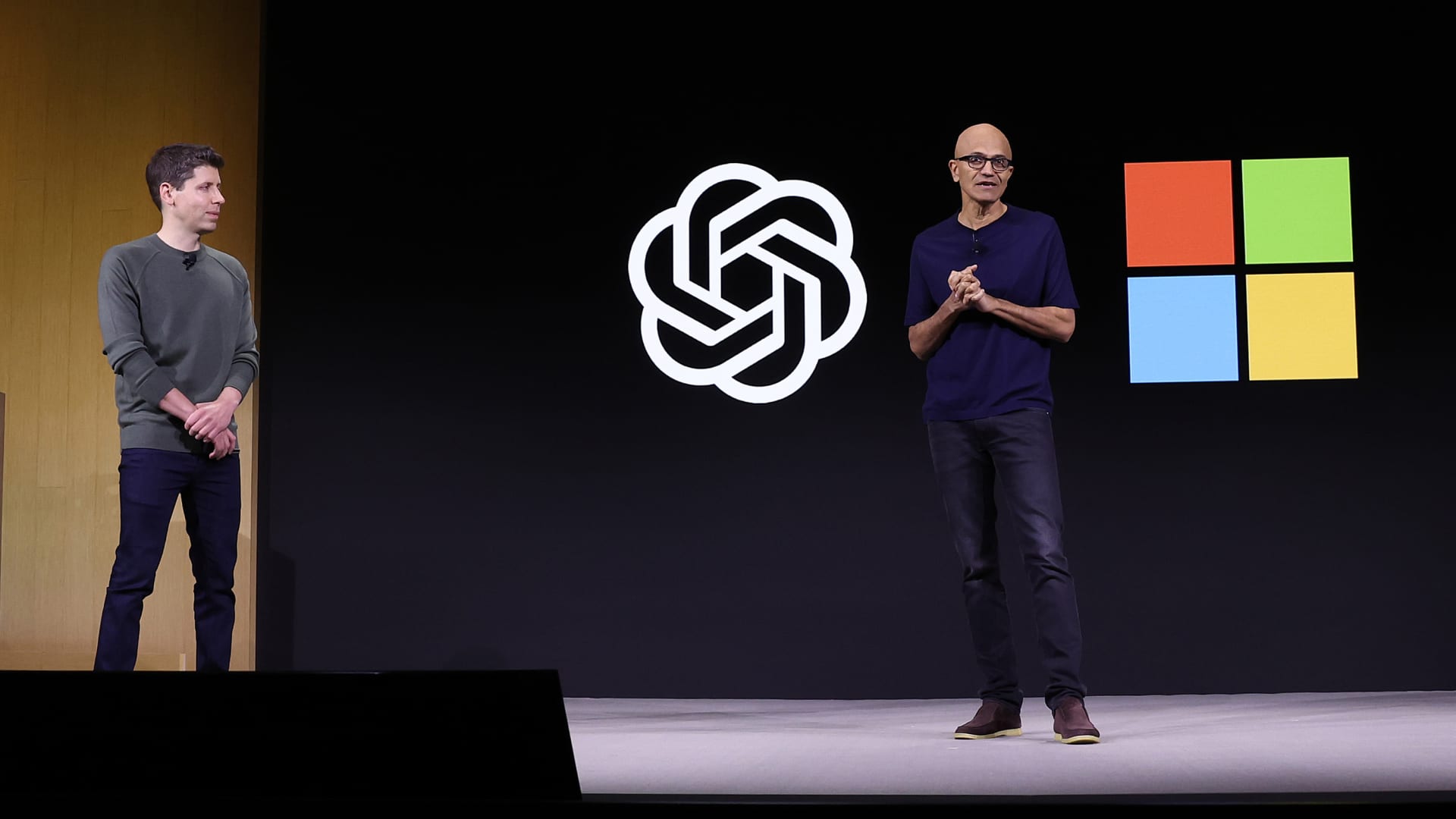 Microsoft CEO Satya Nadella (R) speaks as OpenAI CEO Sam Altman (L) looks on during the OpenAI DevDay event on November 06, 2023 in San Francisco, California. Altman delivered the keynote address at the first ever Open AI DevDay conference. 