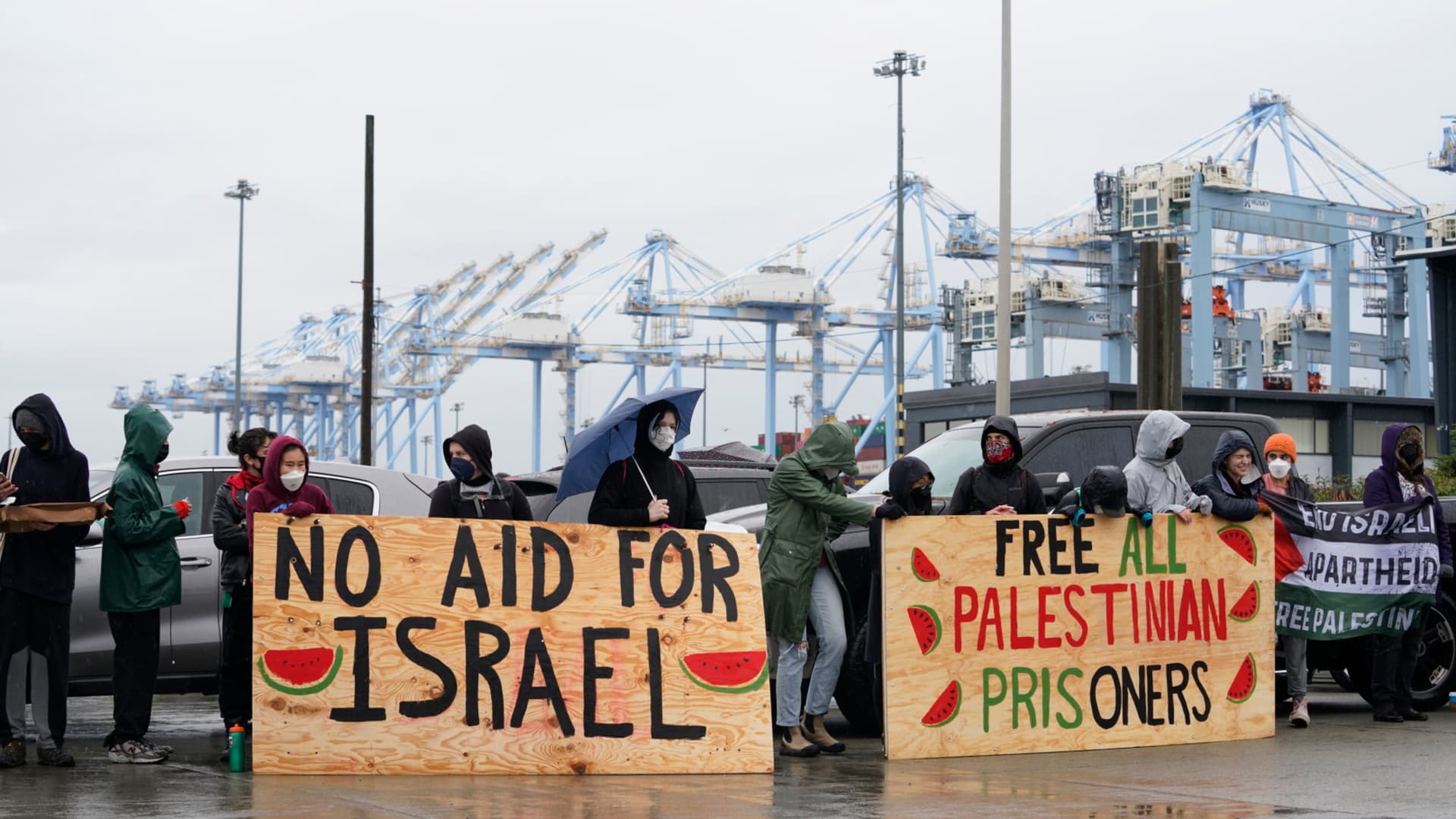 Pro-Palestinian protesters block access to an entry point at the Port of Tacoma in Tacoma, Washington, US, on Monday, Nov. 6, 2023. The protesters are demonstrating what they believe is a military supply ship that is docked at the port and bound for Israel, according to the Seattle Times. Photographer: M. Scott Brauer/Bloomberg via Getty Images