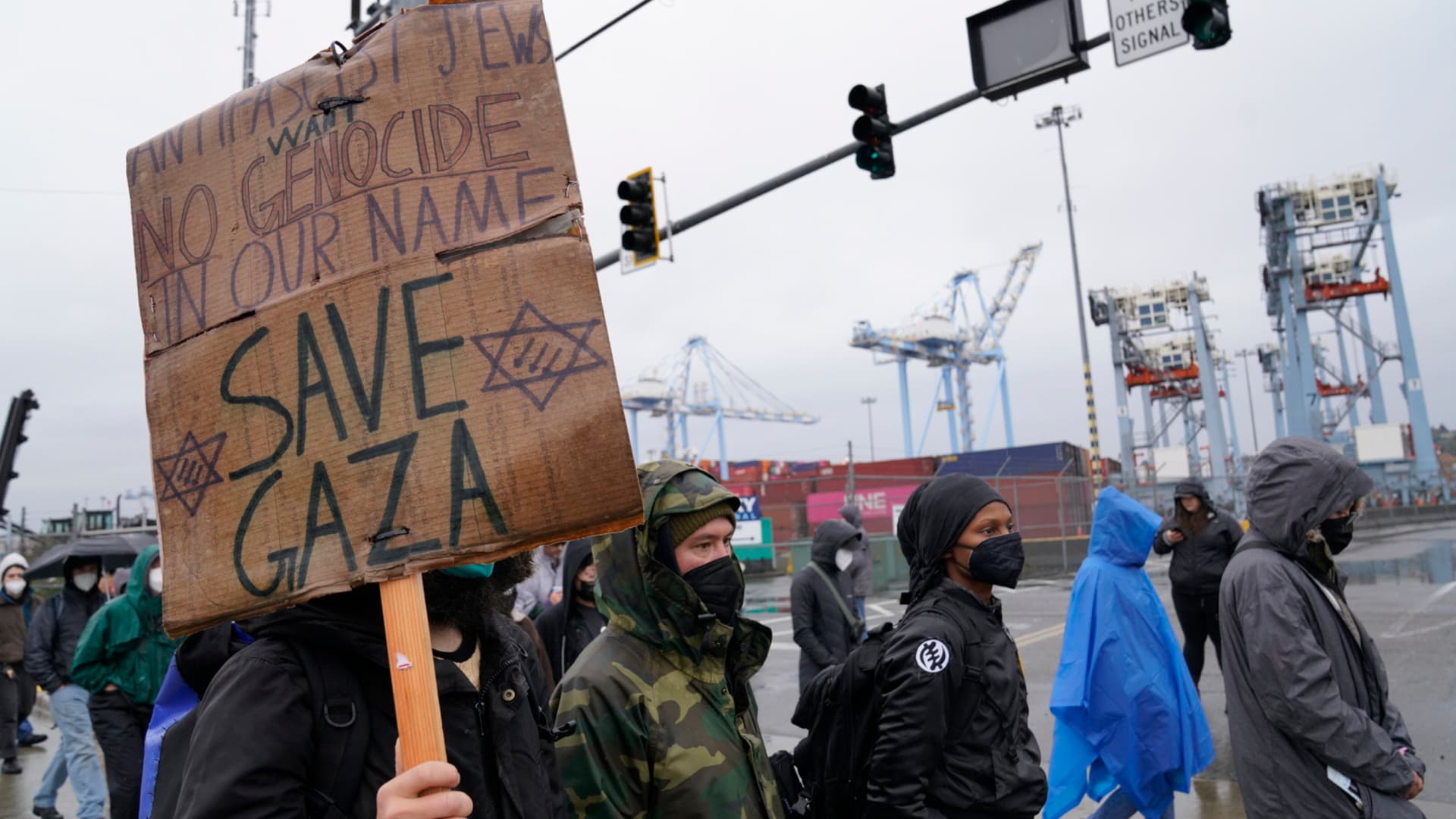 Pro-Palestinian protesters block access to an entry point at the Port of Tacoma in Tacoma, Washington, US, on Monday, Nov. 6, 2023. The protesters are demonstrating what they believe is a military supply ship that is docked at the port and bound for Israel, according to the Seattle Times. 