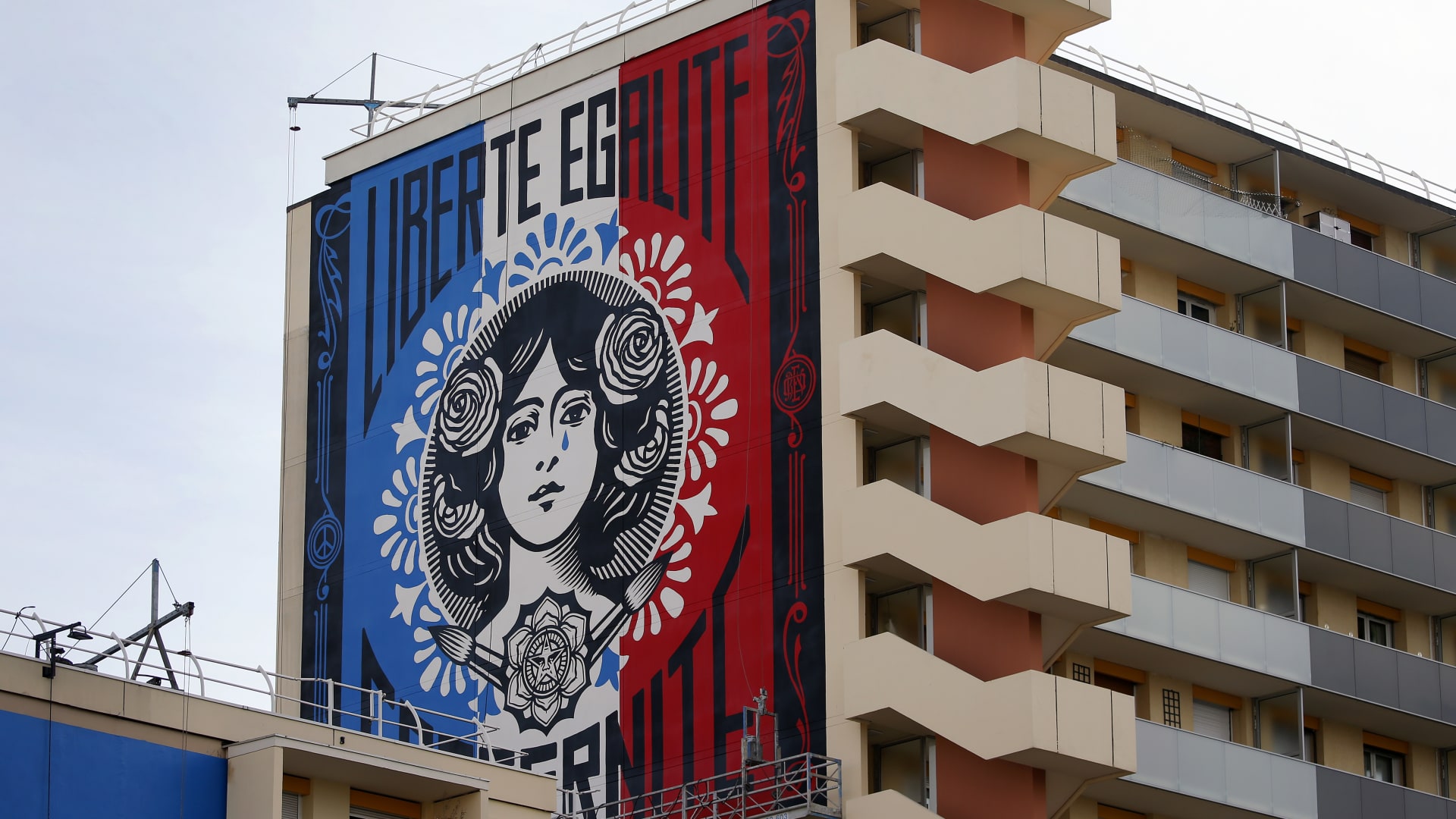 A large fresco by the American artist Shepard Fairey on the wall of a building in Paris, France. Sotheby's has a number of Fairey's prints for sale online as part of its 'collection starters' range.