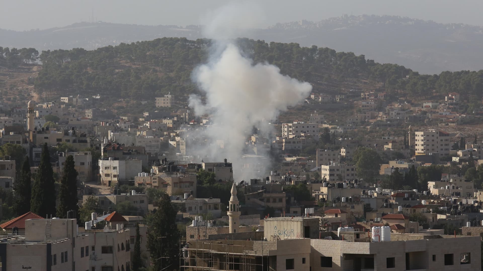 Smoke rises after Israeli Forces raid to Jenin Refugee Camp in Jenin, West Bank on November 09, 2023.