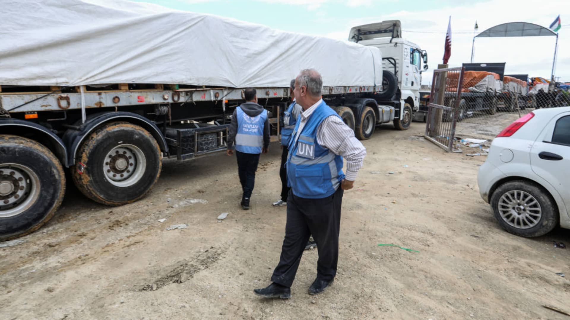 Trucks carrying humanitarian aid enters the Rafah border crossing as the Israeli attacks continue in Rafah, Gaza on November 15, 2023.